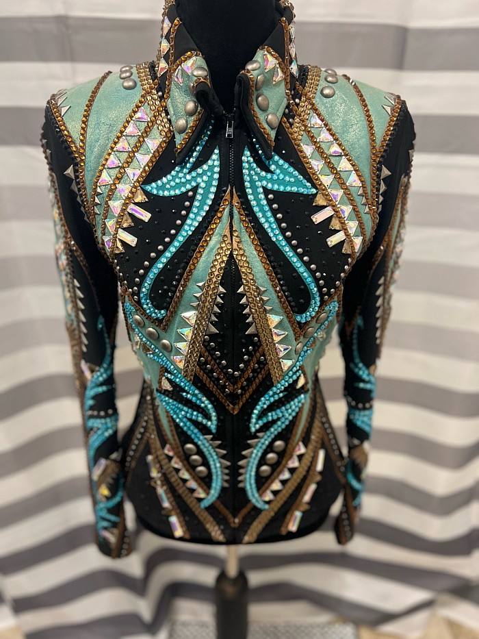 In on consignemt at CRS Custom Creations! Stunning Silver Lining showmanship jacket. Priced at $2,000. This jacket is stunning. Does have a little tiny mark on one sleeve not noticeable when showing. Buyer pays shipping. All sales are final.  Bust 34  Waist 28-30 Hip 36  Shoulder 16  Arms 24